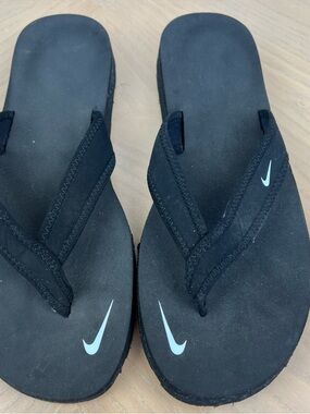 Nike Celso Black Flip-Flop Sandals with White Swoosh Accents